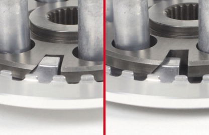 Close-up of metal gears on a white background