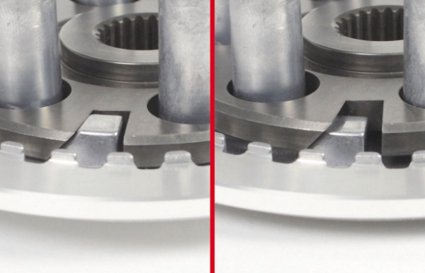 Close-up of metal gears on a white background
