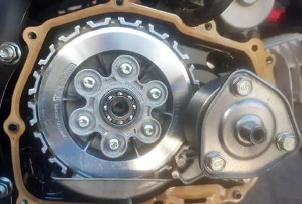 Close-up of a mechanical component, likely part of a vehicle's clutch system.