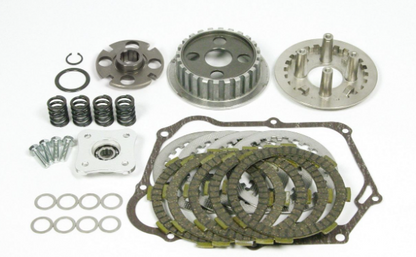 Clutch kit components including springs, washers, and metal parts on a white background