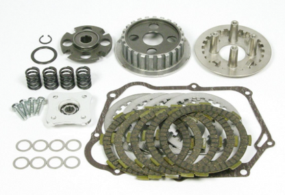 Clutch kit components including springs, plates, and gears on a white background