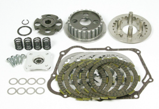 Clutch kit components including springs, plates, and gears on a white background