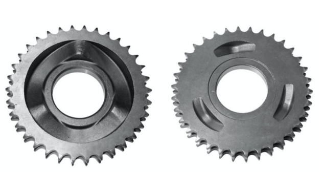 Two metal gears on a white background