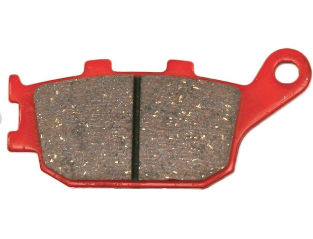 Pair of brake pads with red casing on a white background