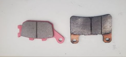 Two brake pads on a white background