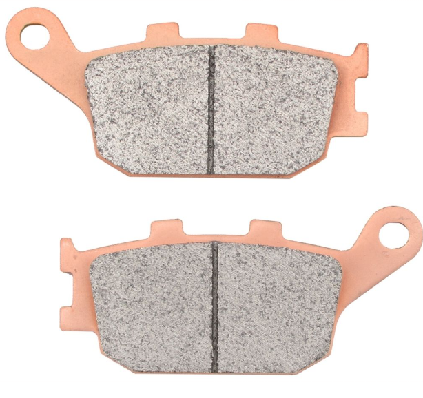 Two brake pads with a metallic backing on a white background