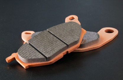 Brake pads on a dark background