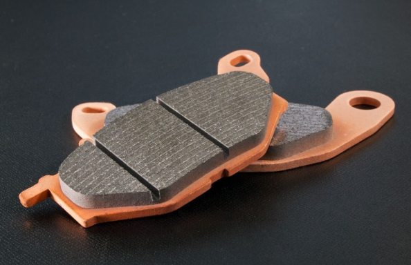 Brake pads on a dark background