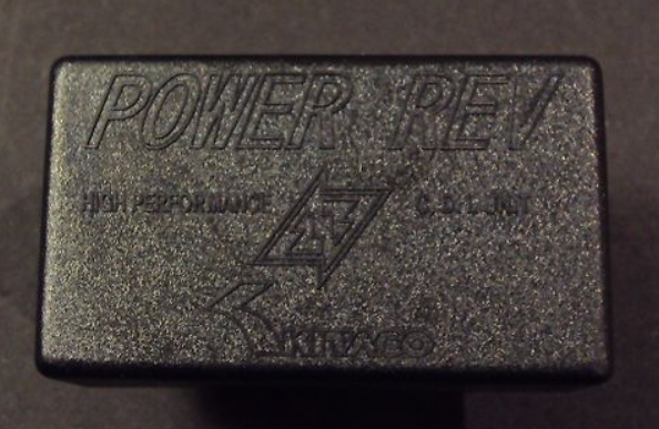 Black rectangular block with 'POWER REV' branding on a dark background