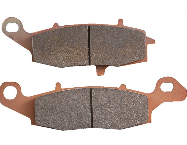 Two sets of brake pads on a white background