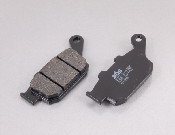 Two brake pads on a white background with 'ST' branding.
