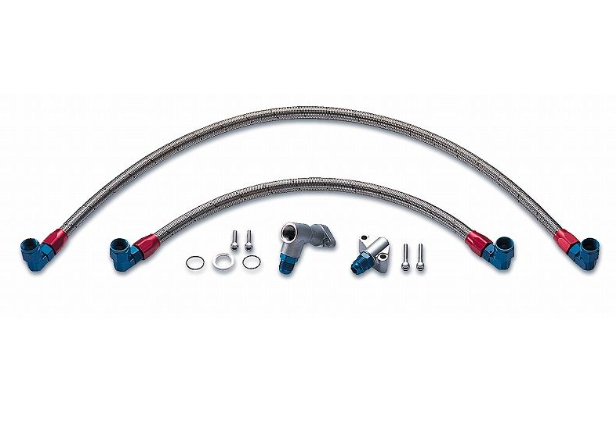 Set of braided metal hoses with connectors on a white background