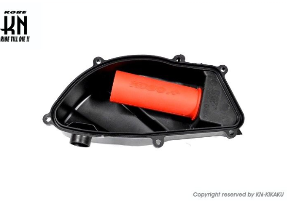 Black air filter housing with a red filter on a white background, featuring the K&N logo.