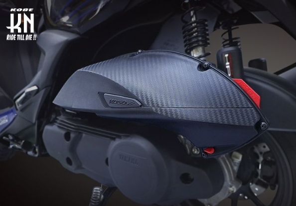 Close-up of a motorcycle's engine cover with branding visible