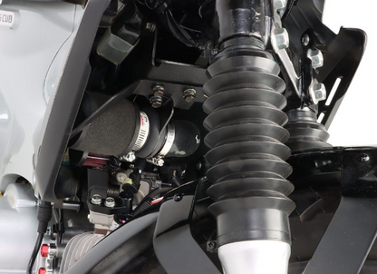 Close-up of a motorcycle suspension system with a white background
