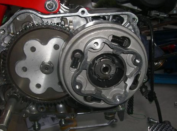Close-up of mechanical components, likely part of a vehicle or machinery engine.