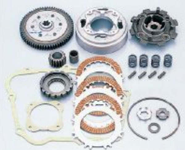Collection of mechanical components including gears and bearings on a white background