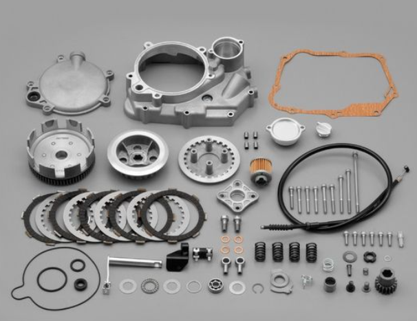 Collection of mechanical parts on a gray background