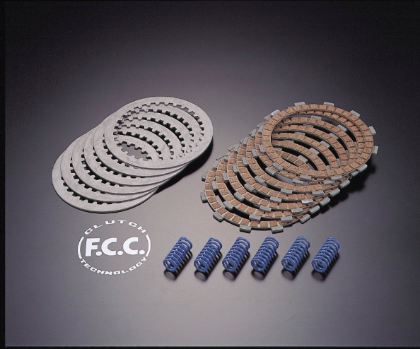 Clutch components including plates and springs on a dark background with F.C.C. branding.