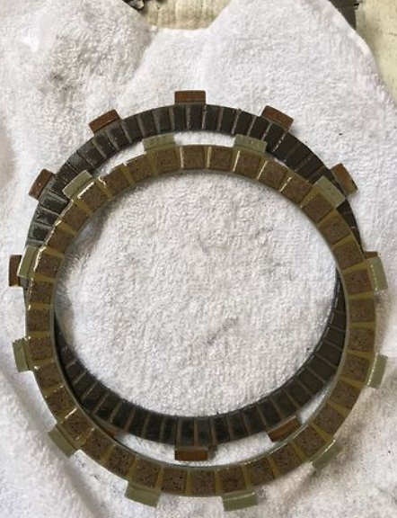 Clutch plate on a white towel