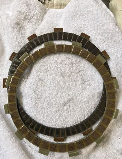 Clutch plate on a white towel