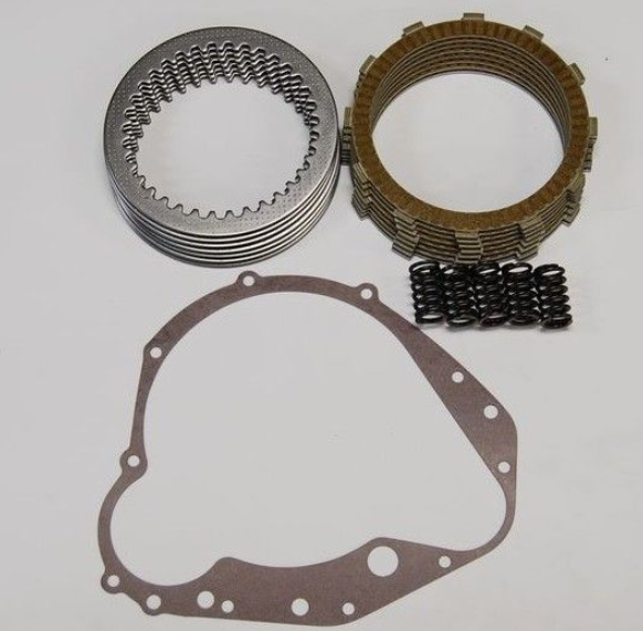 Mechanical clutch plate set with springs and gasket on a white background
