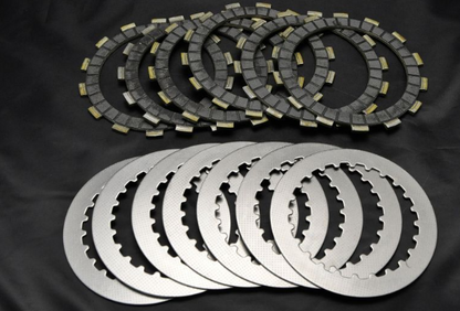 Set of clutch plates on a black background