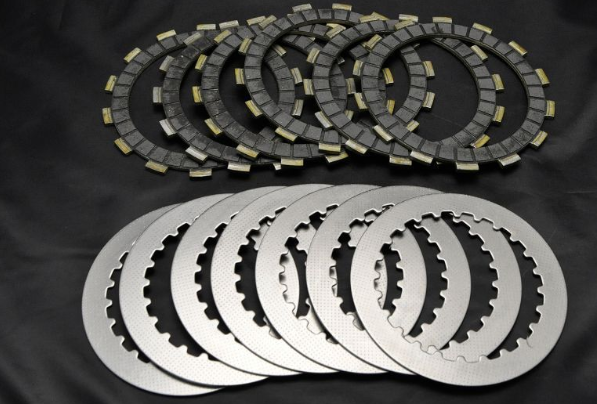 Set of clutch plates on a black background