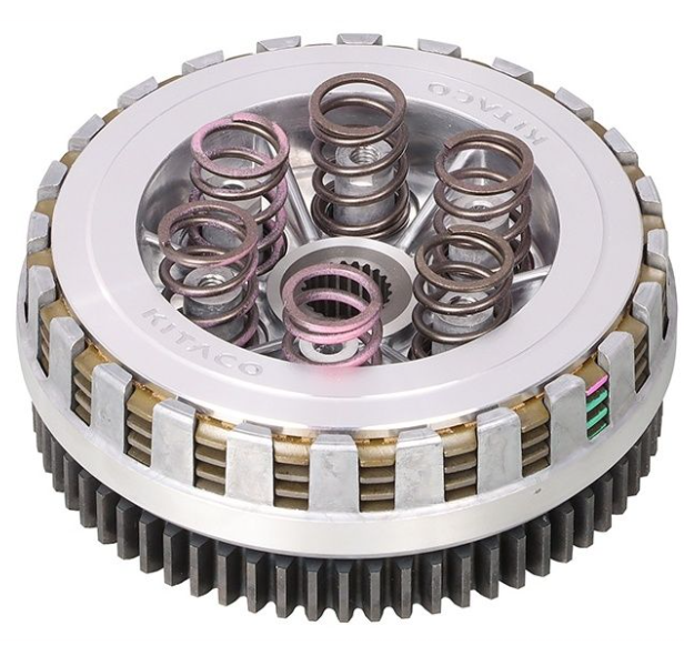Close-up of a mechanical clutch plate with springs on a white background