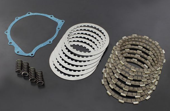 Clutch plate set with springs on a dark gray background