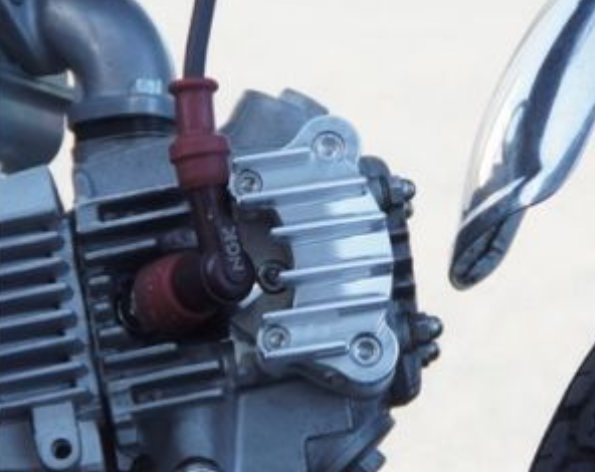 Close-up of a motorcycle engine with a blurred background