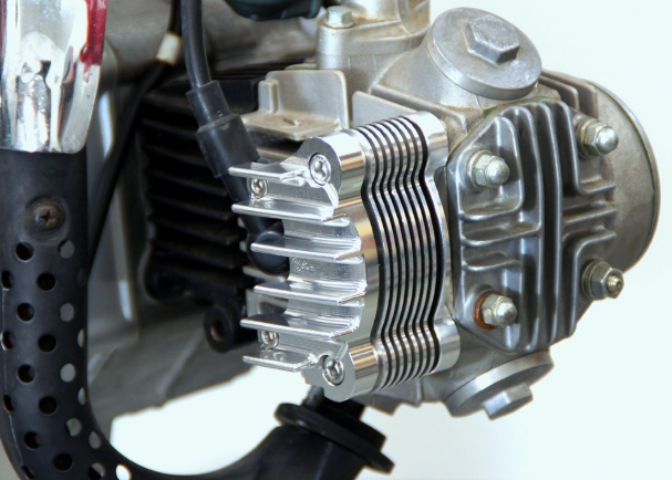 Close-up of a motorcycle engine on a white background