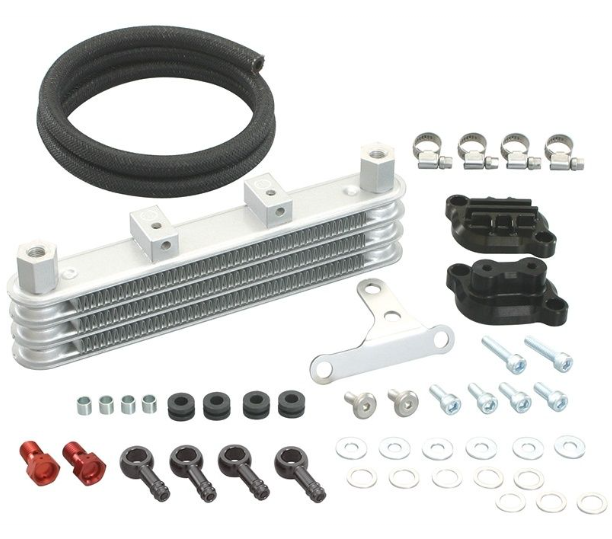 Oil cooler kit with various components on a white background