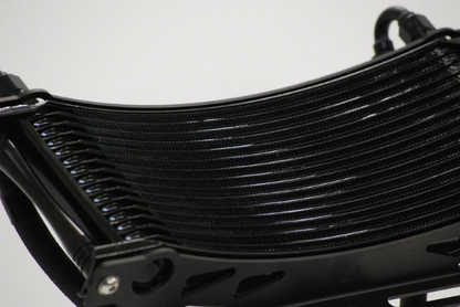 Close-up of a black radiator with a white background