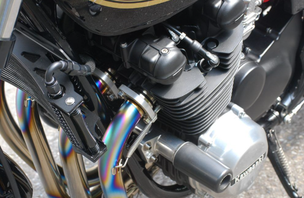 Close-up of a motorcycle engine with metallic components