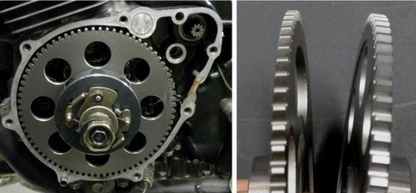 Close-up of mechanical gears and a gear pair on a dark background