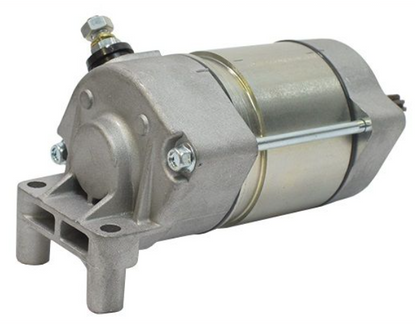 Metallic starter motor on a white background
