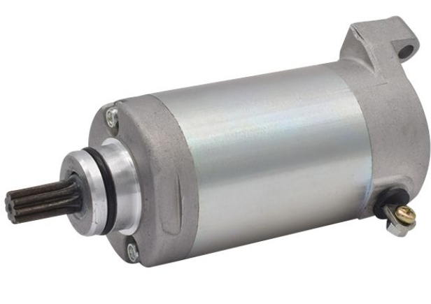 Metallic starter motor on a white background