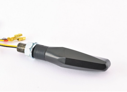 Black motorcycle exhaust pipe with electrical connectors on a white background