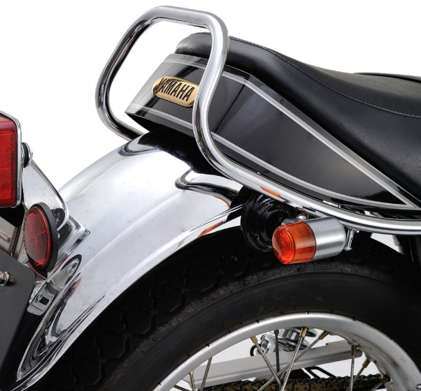Close-up of a motorcycle with a Yamaha logo on the seat