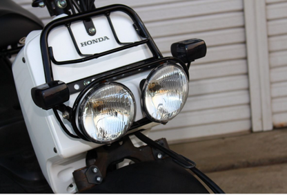 Honda motorcycle headlight with additional lights attached