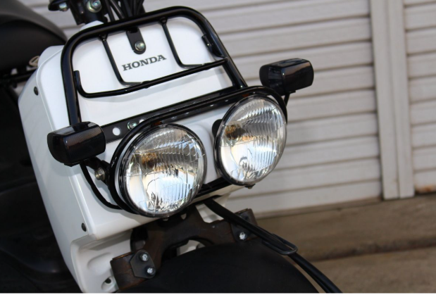Honda motorcycle headlight with additional lights attached