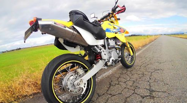 Motorcycle on a road with a scenic background