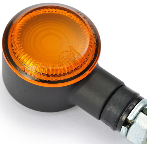 Orange turn signal light on a white background