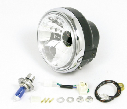 Motorcycle headlight assembly with wiring and components on a white background