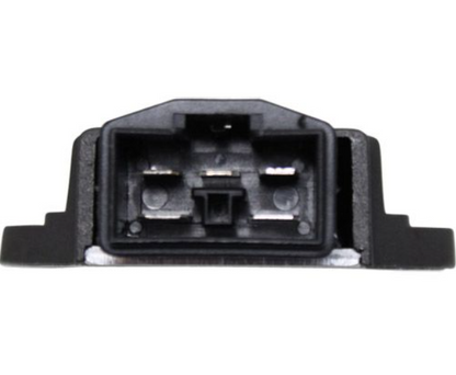 Black automotive part on a white background