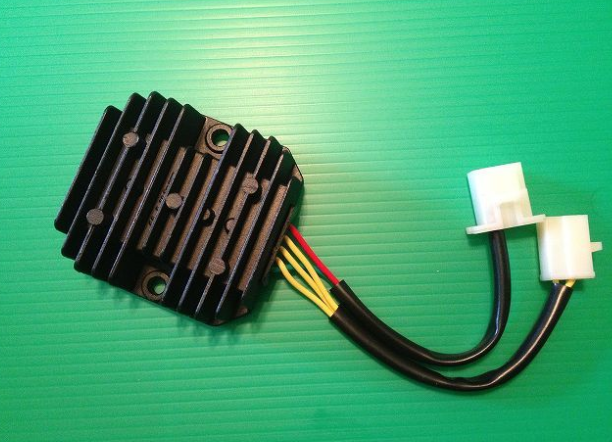 Rectifier/regulator with wiring on a green background