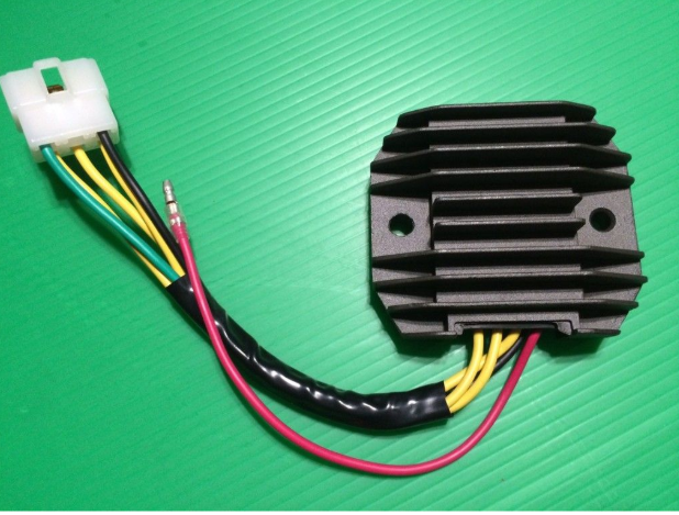 Rectifier with wiring on a green textured background