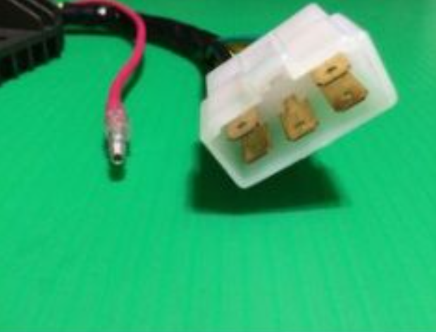Electrical connector with wires on a green background