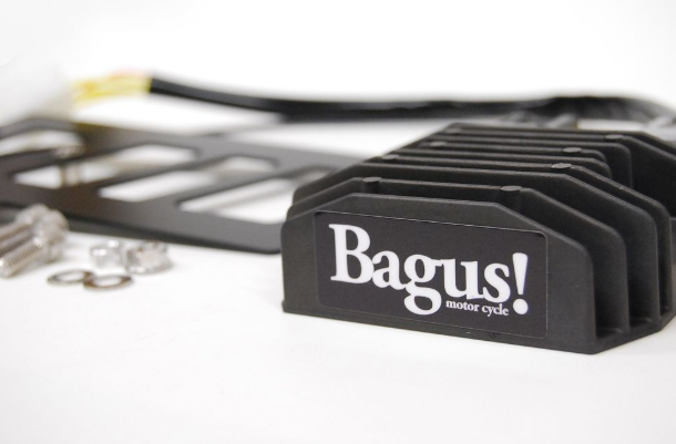 Black motorcycle exhaust with 'Bagus!' branding on a white background